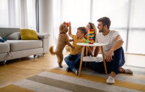 Happy Young Family Having Fun Together At Home. 